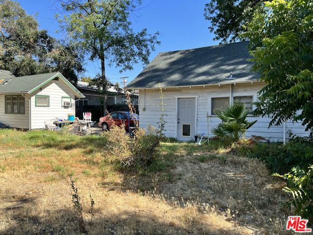 Side of Garage has attached shed