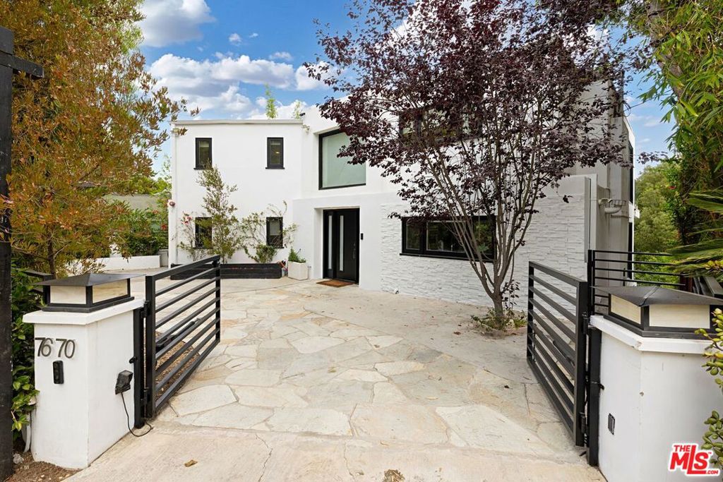 7670 Woodrow Wilson Drive — architectural residence