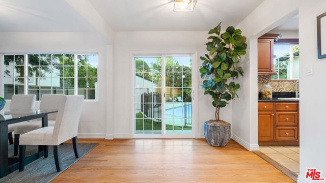 Dining Room to Kitchen (Sliding Glass Doors to Backyard)