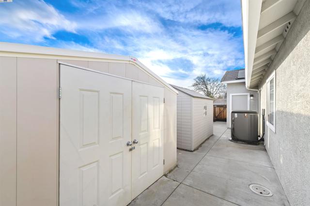 TWO STORAGE SHEDS