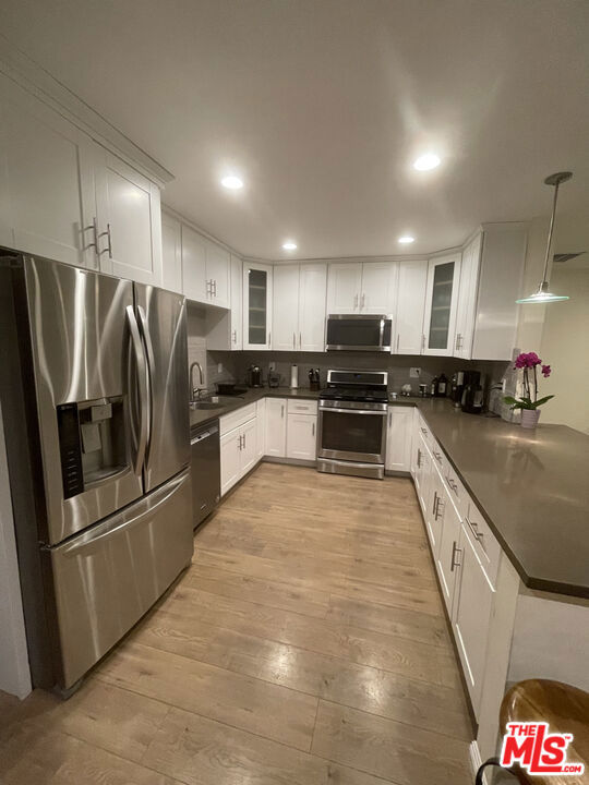 18110 Tarzana Street, Tarzana CA: https://media.crmls.org/mediaz/ad75ad47-a6e8-421d-902d-747ab5d459cf.jpg