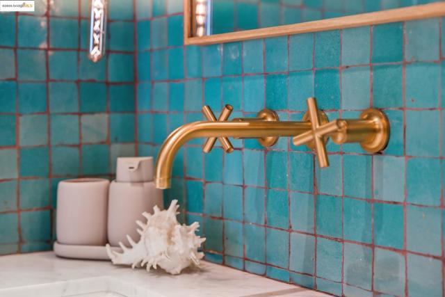 Detailed view of a sink and tile walls
