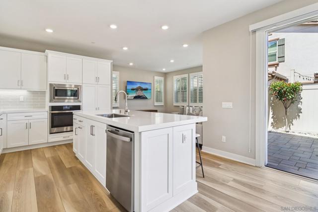 6698 Spartina Ct, Carlsbad CA: https://media.crmls.org/mediaz/adb9e682-bc9c-43a0-b3c1-f92b49928a9a.jpg