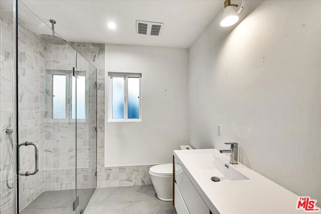 4122 S Bronson Avenue, Los Angeles CA: https://media.crmls.org/mediaz/aec24298-1bd6-46eb-8132-e2c7cc81d4d7.jpg