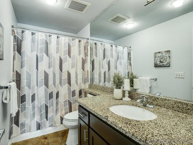 450 J St, San Diego CA: https://media.crmls.org/mediaz/afd97c87-da3e-4345-9dec-caec75d1ee1d.jpg