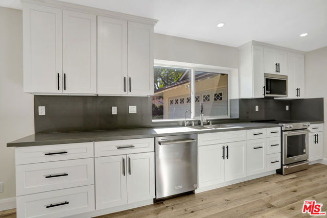 23153 Gonzales Drive, Woodland Hills CA: https://media.crmls.org/mediaz/b04058f0-d843-4bb8-85a3-afd817fa9838.jpg