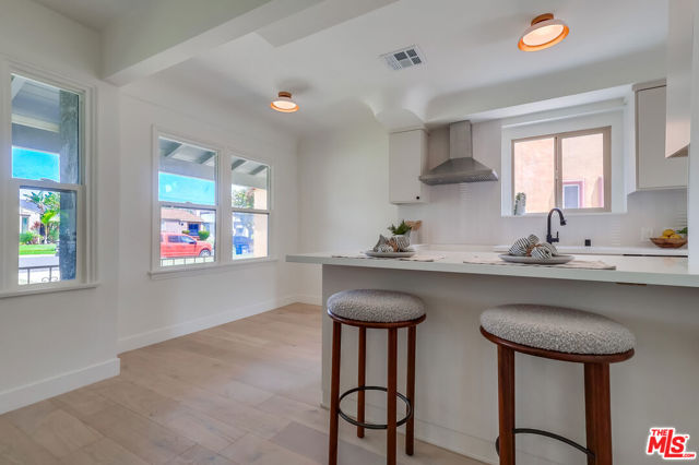 9116 S Wilton Place, Los Angeles CA: https://media.crmls.org/mediaz/b1011edd-057c-4c78-b3fc-46a7d9f28d55.jpg