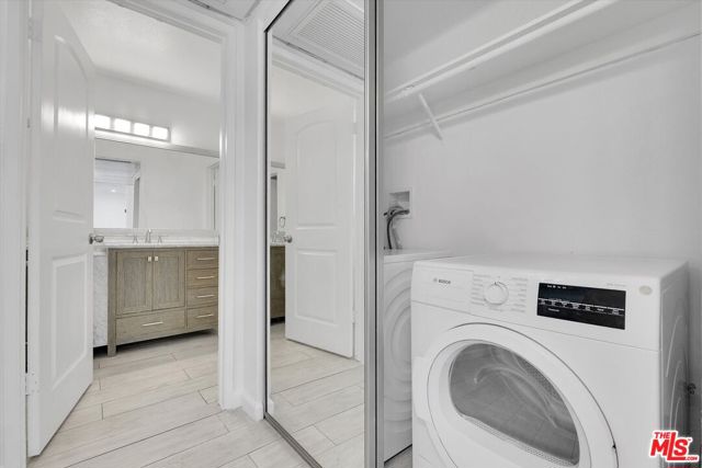 Hall closet (with washer and d