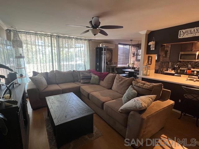 **Charming & Stylish Condo with Unique Features and Low HOA!** Welcome to your ideal home—this beautifully maintained 1-bedroom, 1-bath condo blends comfort, style, and convenience in a sought-after location. Step inside and enjoy a warm, inviting living space with crown molding, custom paint, and laminate flooring throughout the main areas, while tile in the kitchen and bathroom adds durability and ease of maintenance. The spacious bedroom offers plush carpeting, a ceiling fan, and a generous closet, perfect for storage and relaxation. Enjoy year-round comfort with an energy-efficient mini-split system providing both heating and cooling, along with additional wall heaters and ceiling fans in both the living room and bedroom. The kitchen is a chef’s delight with stainless steel appliances, elegant quartz countertops, and a built-in water filtration system. A charming wainscoted vanity area adds a touch of sophistication to the bathroom. Step outside to not one, but **two private patios**—ideal for morning coffee or evening gatherings. This is the only unit in the complex with a **security screen door**, offering peace of mind and fresh air flow. Additional highlights include: Shared garage with dedicated storage space, Convenient on-site laundry, Refreshing community pool, Guest parking with permit, Super low HOA of just $258/month, Walking distance to shopping, the library, and a variety of restaurants. Don’t miss this rare opportunity to own a unique unit in a well-maintained complex with unbeatable value.