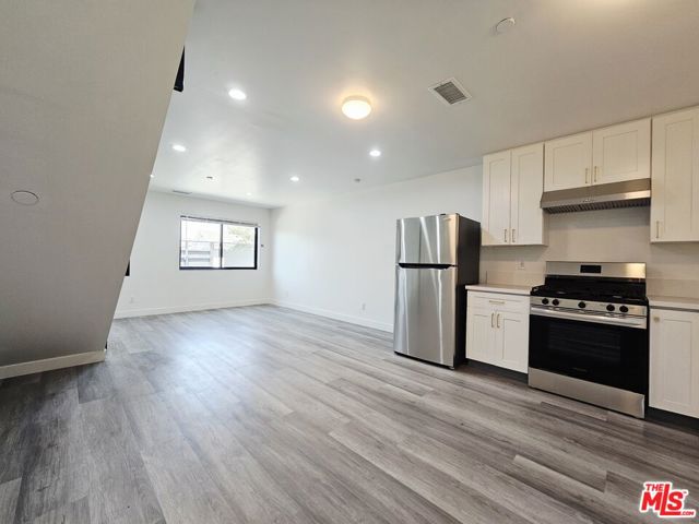 4110 S Normandie Avenue, Los Angeles CA: https://media.crmls.org/mediaz/b2f948f5-2910-4658-b1a7-8b9f9f71c316.jpg