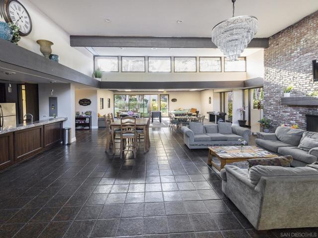 Clubhouse with Kitchen, Seating Area, Fireplace, and Billiards