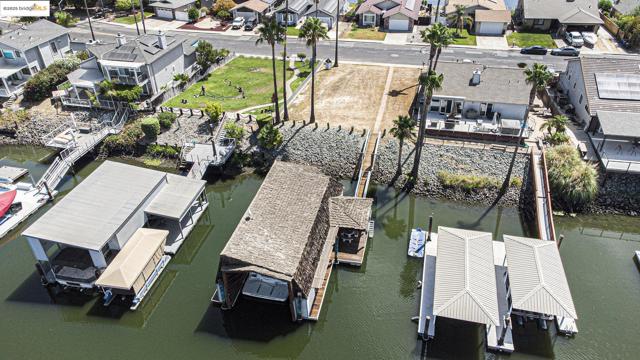 Aerial view of residential area with a large body of water