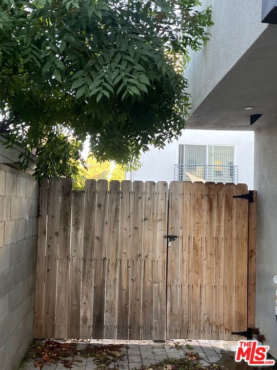 Entrance to the private back y