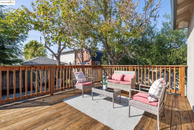 Wooden deck with an outdoor living space