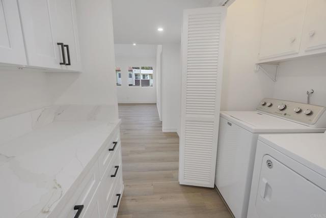 Full size Washer + Dryer conveniently located near to Bedrooms!  FAB Custom Cabinets 4 Linens + Misc