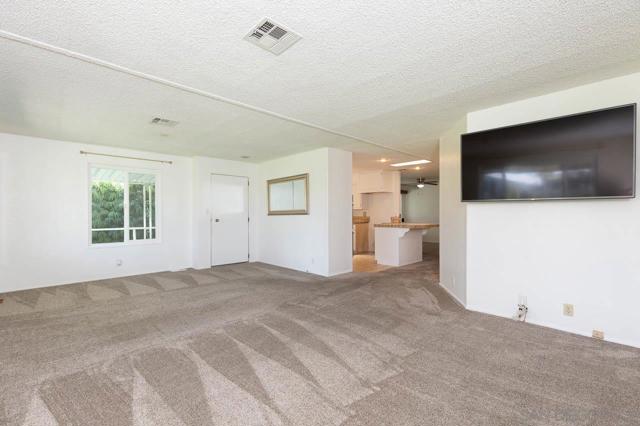 Living Room with view to the Kitchen!