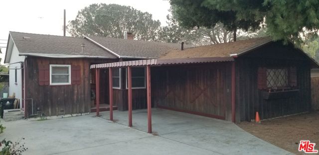 2372 DEWEY Street Santa Monica, California Venice 50's 3+2+Rumpus room. Original Family. Trust Sale. Rear facing bedroom and living room with brick fireplace & wall to wall mantel. View potential down Glenavon to Penmar Golf Course. About 1 mile to the beach. Whole Foods near by. Wood floors covered by carpet for years. Enter Galley Kitchen with laundry hookups from foyer or dining area. Most windows dual-pane. Hall Bath has mint green tub and painted sink and shares shower with primary bedroom's bath. Garage converted to rumpus room with permit. Carport and extra parking in front. Bring your architects, builders & DIYers. Sold As-Is. Seller will not do any work or give termite clearance.