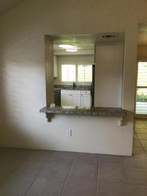 View through opening to kitchen