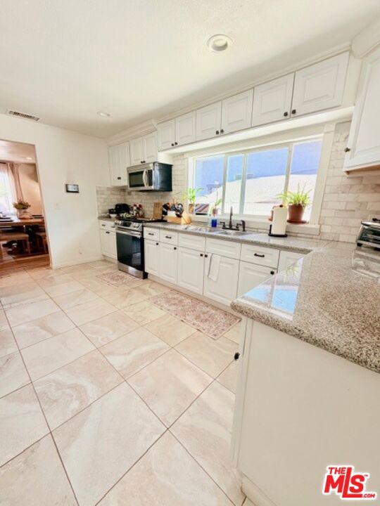 2940 Live Oak Street, Huntington Park CA: https://media.crmls.org/mediaz/b75f85b9-c6e3-4f62-8303-408bc229f4b5.jpg