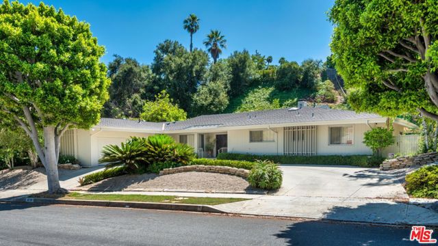 Welcome to Casa Maybrook, a beautifully maintained mid-century ranch home in prestigious BHPO. This specific BHPO pocket is known for its charm, tree-lined streets, and proximity to Beverly Hills. The circular driveway adds convenience and curb appeal. With room for renovation, this is a rare opportunity to customize on a coveted sidewalk-lined street with a spacious lot. The house boasts a 100-foot frontage and a western orientation for all-day sunlight. Don't miss this unique chance to be the visionary behind the transformation of this remarkable property.