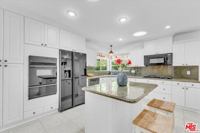 23264 Calvert Street, Woodland Hills CA: https://media.crmls.org/mediaz/b80c7018-f72f-43ff-b533-7545f3ec333c.jpg