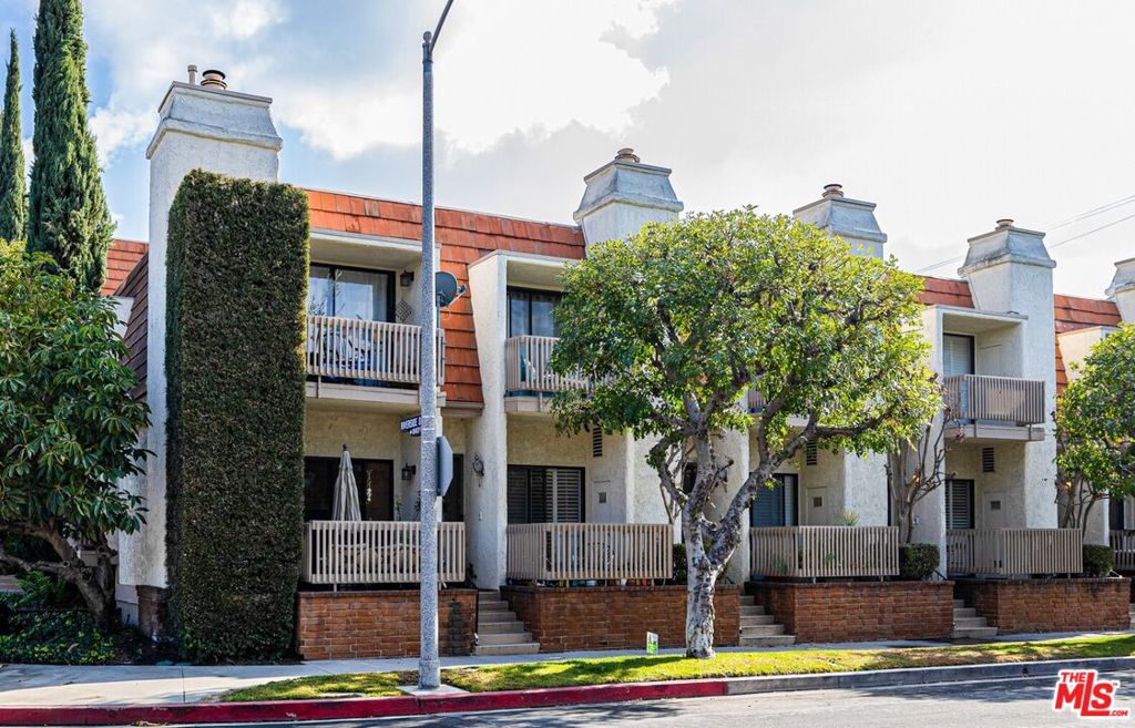 Beautifully Upgraded Townhome in Prime Toluca Lake Neighborhood! With its own private entrance, this unit features a modern open-concept layout & hardwood floors throughout. Split-level living room/dining area w/ fireplace, crown mouldings, & recessed lighting. Kitchen w/ upgraded cabinets, granite countertops, & breakfast nook. Open-air balcony in front & private gated patio in rear - perfect for entertaining! Upstairs landing offers dual spacious En-Suite Bedrooms (one with walk-in closet & front-facing open-air balcony), side-by-side laundry area, & storage. 2 subterranean gated parking spaces. Central AC + heat. Close by to metro, studios & the best shopping, dining, & entertainment the area has to offer. Turnkey!