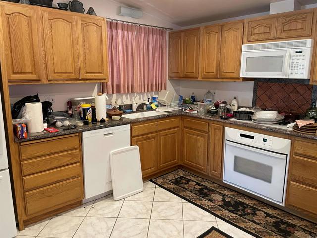 Detail Gallery Image 5 of 11 For 3395 Lockwood Dr, San Diego,  CA 92123 - 4 Beds | 2 Baths