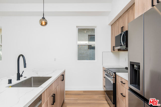 10819 Morrison Street, North Hollywood CA: https://media.crmls.org/mediaz/b935a333-8b33-4fde-968e-437bf4118478.jpg