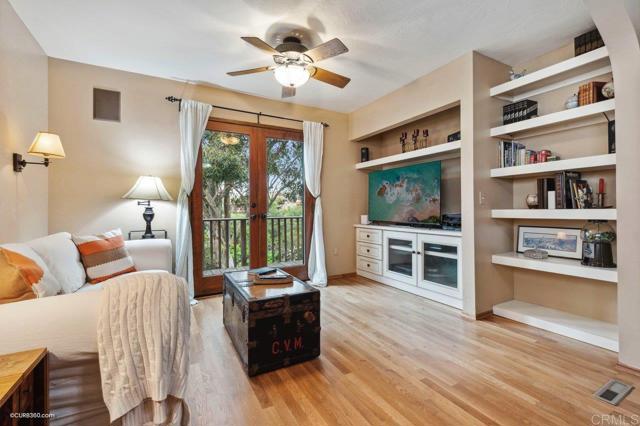 Family room with French doors leading to the back deck for all year round enjoyment