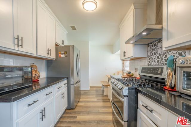 10725 S 8th Avenue, Inglewood CA: https://media.crmls.org/mediaz/ba6cdc30-1b85-40b7-8d70-299024780ad0.jpg