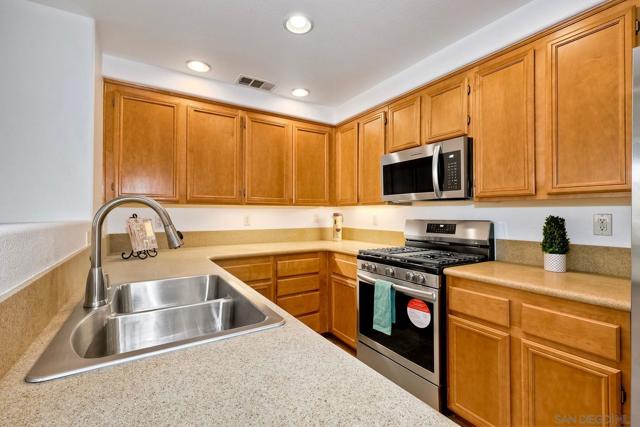 Check out the abundant counter space and brand new stainless steel sink and faucet!