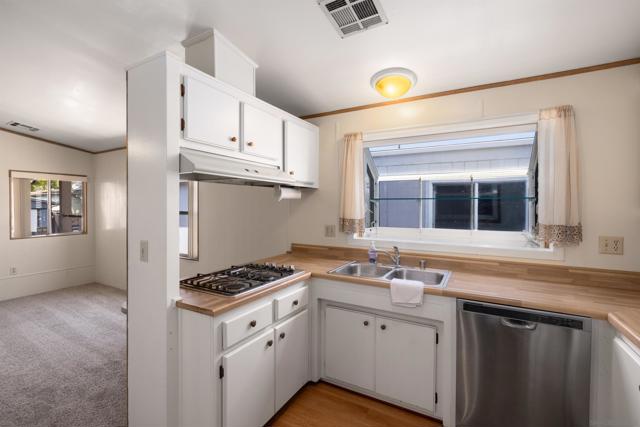 9255 N Magnolia Avenue, Santee CA: https://media.crmls.org/mediaz/bb21978d-2b55-4590-bd45-c703bcf93f9f.jpg
