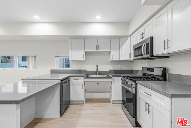 1409 N Hobart Boulevard, Los Angeles CA: https://media.crmls.org/mediaz/bb244935-9694-41f6-a33e-c1dac0b3535c.jpg