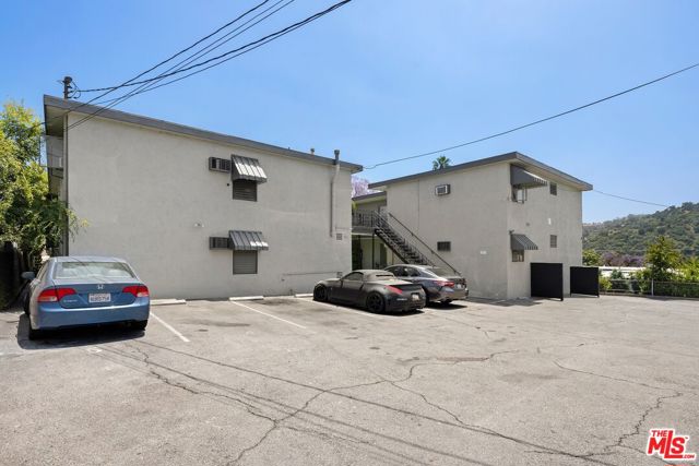 Back of Property w/ 16 Parking Space - 144 S. Ave. 55