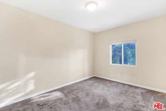 1073 S Mansfield Avenue, Los Angeles CA: https://media.crmls.org/mediaz/bc9b2a14-5ce3-4244-9869-5f3d282b6301.jpg