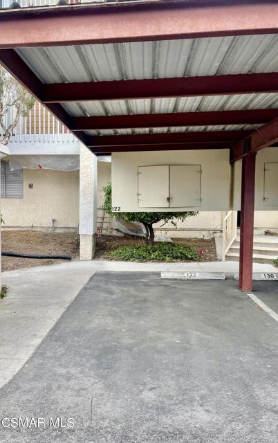 Carport and storage in front of unit