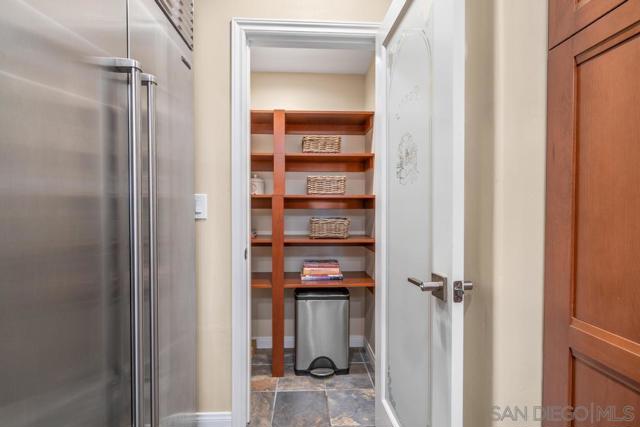 Pantry with wood shelving