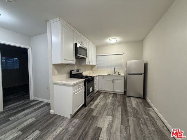 2922 S Budlong Avenue, Los Angeles CA: https://media.crmls.org/mediaz/bd80d13c-e3b0-4573-9061-fbd44cf9c040.jpg
