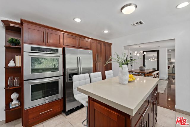 4745 Caritina Drive, Tarzana CA: https://media.crmls.org/mediaz/bdf28384-60b9-4b53-8296-5ff7e1b0b9cf.jpg