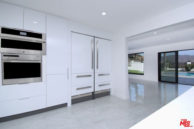 12112 Woodley Avenue, Granada Hills CA: https://media.crmls.org/mediaz/be34b81a-b311-4be5-a454-bedac0280ef9.jpg