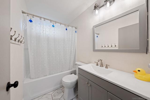 10424 Nubbin Ct, Santee CA: https://media.crmls.org/mediaz/bebf30aa-c6ce-483f-9c79-2edd68655817.jpg