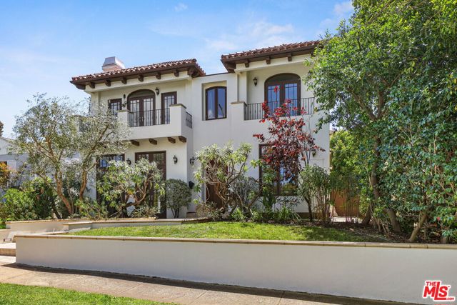 560 RADCLIFFE Avenue Pacific Palisades, California This stately Mediterranean style home is in one of Pacific Palisades' most sought after neighborhoods. Located on lower Radcliffe Avenue, the area attracts homeowners seeking a relaxed urban lifestyle, sidewalks and proximity to outdoor recreation, spectacular natural beauty and ocean bluff vistas, Palisades Charter Elementary and Pali Charter High School, village private schools, old town center, and the new Palisades Village. The 2002 built revivalist style home and its classic design elements of arched entries, balconies, wood floors, ironwork, and turret accentuated spiral staircase are enhanced by numerous windows, glass paneled doors and high ceilings to create spaces of light, warmth, and volume. Peaceful and private outdoor living are realized with its large yard, direct access detached 2-car garage, built-in cooking center, mature landscaping and abundant shade, palm and fruit bearing trees. This is where the Palisades lifestyle lives.