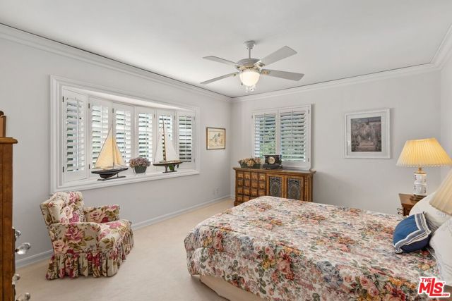 Bedroom with walk-in closet