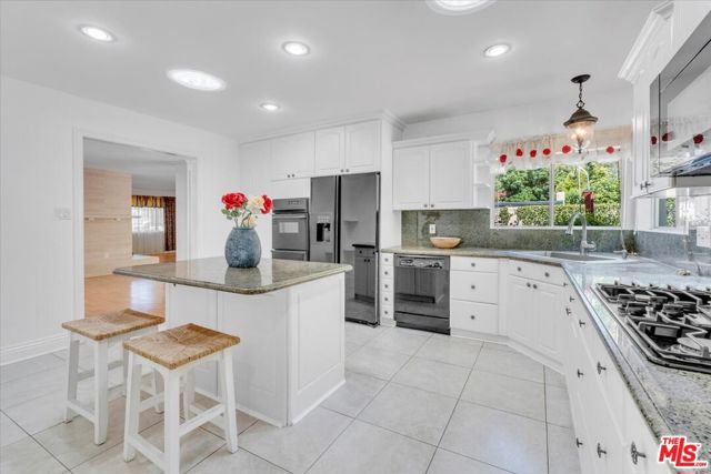 23264 Calvert Street, Woodland Hills CA: https://media.crmls.org/mediaz/c0b5b847-9620-4321-a6b8-c1b34a959d4b.jpg