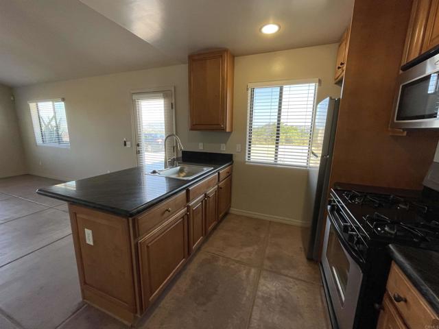 12478 Hillpoint Court, Valley Center CA: https://media.crmls.org/mediaz/c0e4c7ac-afe8-4f6c-8af2-18074c48372d.jpg