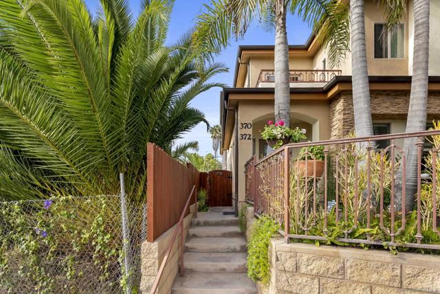 A coastal façade framed by surf breezes and the promise of ocean glimpses.