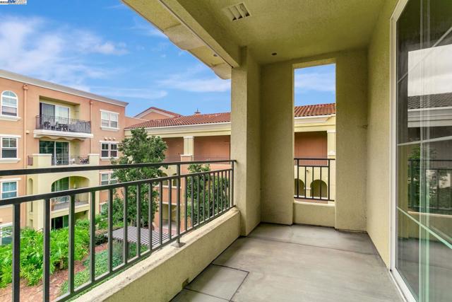 Cozy balcony overlooking courtyard