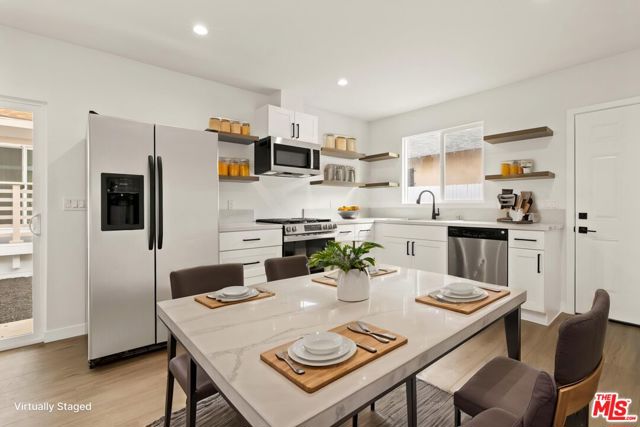 1558 W 47th Street, Los Angeles CA: https://media.crmls.org/mediaz/c11e8980-bf00-43cc-8a63-b84fa5ed68ee.jpg