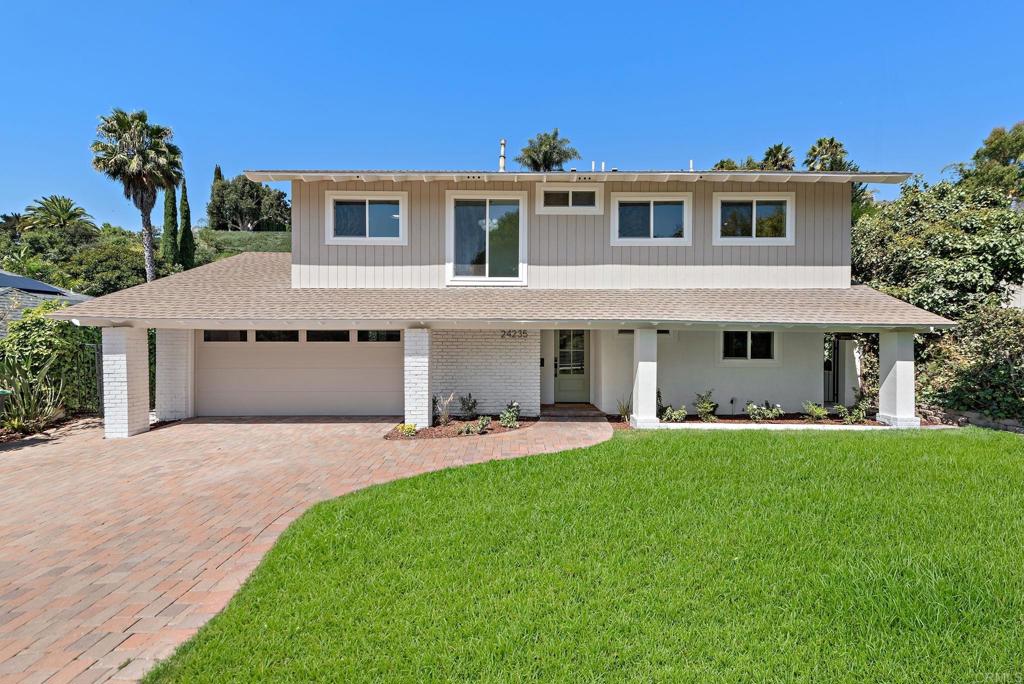 Welcome to your dream home in the charming Pacesetter II area of Laguna Niguel! This immaculately remodeled two-story residence, situated on a generously sized lot, boasts 5 bedrooms and 3 full bathrooms, offering a perfect blend of comfort and style.   As you arrive, you will be greeted by a lush, green front yard that sets the tone for the inviting space inside. Step through the front door and will immediately notice the quality craftsmanship and thoughtful design that define this home. The cozy stuccoed fireplace creates a warm, welcoming atmosphere in the living room, setting the stage for relaxation.   An open floor plan ensures a seamless flow between the downstairs living areas, ideal for both entertaining and everyday living. Adjacent to the living room, the elegant dining area features a dry bar with a wine fridge—perfect for hosting gatherings and making memories. From here, move effortlessly into the family room, a cozy spot designed for connection and comfort.   The heart of this home is the expansive kitchen, where form meets function. Oak cabinets surround a large black center island, complete with a farmhouse sink and sleek state-of-the-art appliances. State-of-the-art appliances, a pot filler above the stove, and a chic backsplash make this kitchen a chef’s delight. Dual multi-fold doors open up to the large backyard, enhancing your indoor-outdoor living experience and providing ample space for al fresco dining, gardening, or simply unwinding in your private outdoor retreat.   Upstairs, the primary suite is a serene retreat featuring a spacious walk-in closet and a luxurious ensuite bathroom. Dual vanities and a large walk-in shower with bench, finished in timeless neutral tones, create a spa-like ambiance. Three additional upstairs bedrooms and a full bathroom provide ample space for family and guests.  A versatile downstairs bedroom and full bathroom offer the flexibility for a guest room, home office, or additional living space. Additional upgrades include a new HVAC system, water heater, and electrical panel, providing modern convenience and peace of mind.  Nestled in a quiet neighborhood, this home is moments from active hiking and biking trails, the beach, and the vibrant Lantern District. Enjoy easy access to a variety of dining, shopping, and entertainment options—all within easy access.   Come experience the perfect blend of elegance and practicality on this spacious lot in Laguna Niguel. Your new chapter begins here—schedule a private showing today!