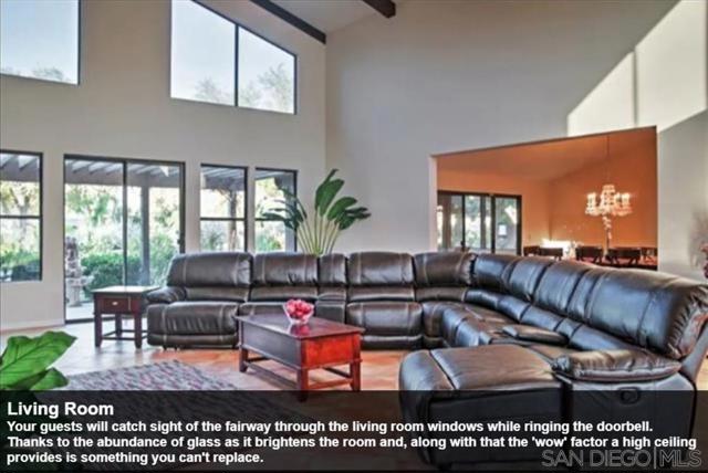 Your guests will catch sight of the fairway through the living room windows while ringing the doorbell. Thanks to the abundance of glass as it brightens the room and, along with that the 'wow' factor a high ceiling provides is something you can't replace.